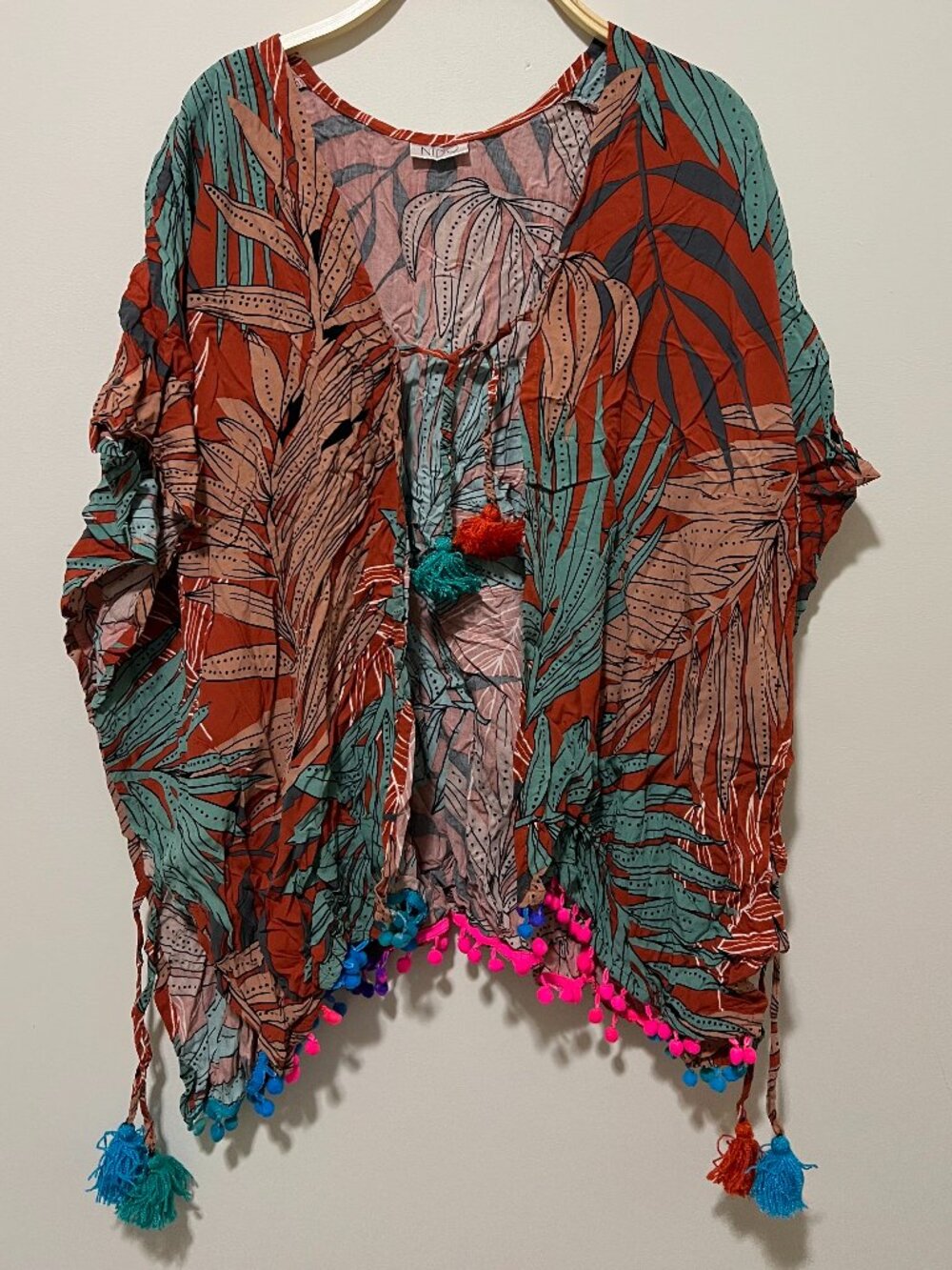 Tropical coverup with tassel details